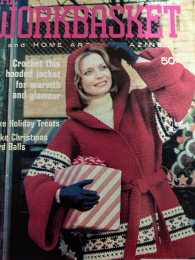 December 1978 Cover of Workbasket Magazine.  Hooded crocheted jacket - red with cross-stitch detail