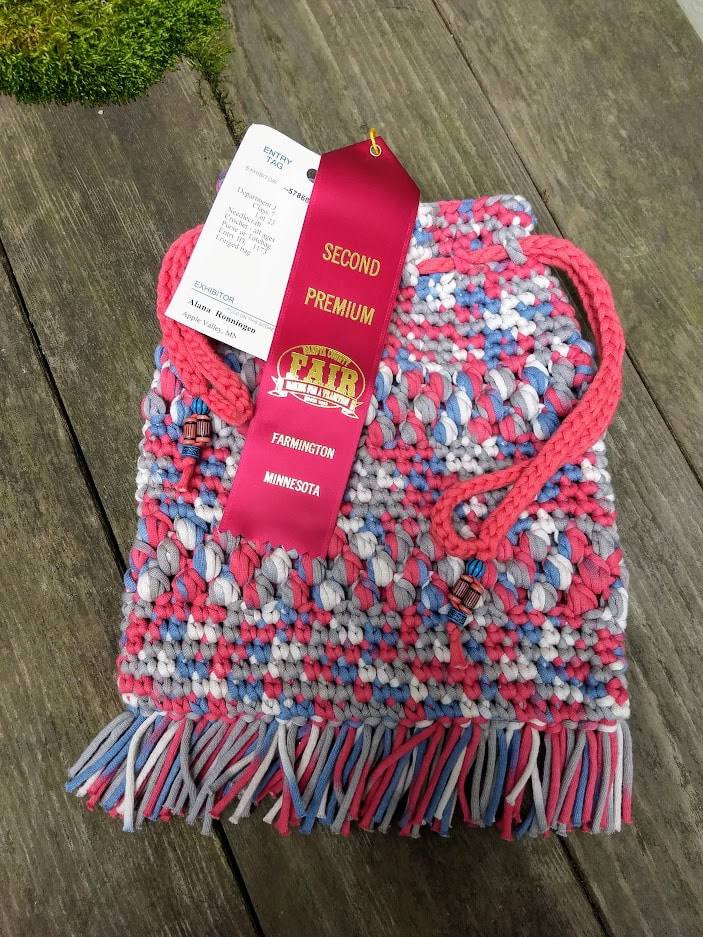 Crocheted bag with fringe from May 1977 Workbasket Magazine with second place ribbon